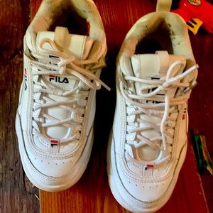 White and black fila sneakers